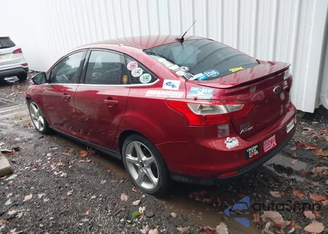 2014 Ford Focus Titanium z USA, uszkodzony, nr VIN 1FADP3J21EL309924